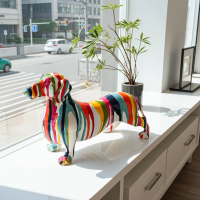 Ellá – Dackel Skulptur Bunt